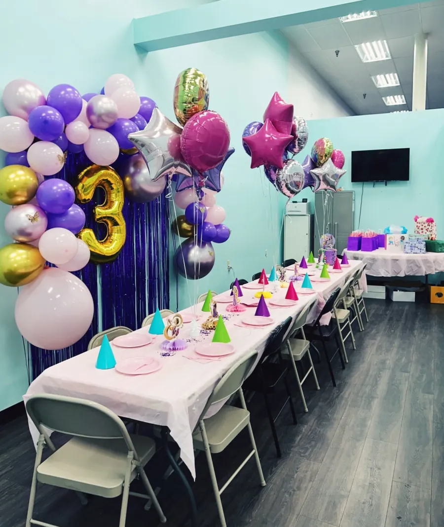 A birthday party table set up at Galaxy Gymnastics